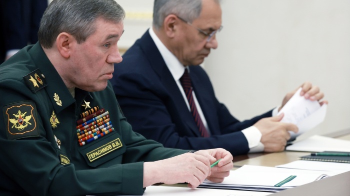 Former Russian Defense Minister Sergei Shoigu, right, and Russian Chief of General Staff Gen. Valery Gerasimov attend a meeting of Russian President Vladimir Putin with commanders of military districts at the Kremlin in Moscow, Russia, May 15, 2024. 